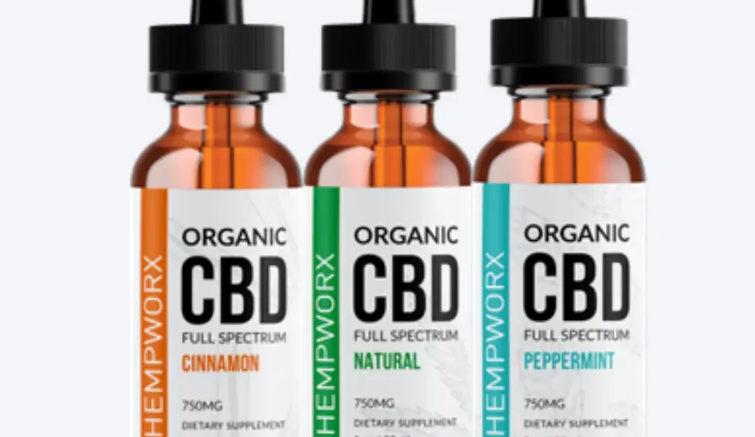 Three HempWorx organic CBD oil bottles in different flavors